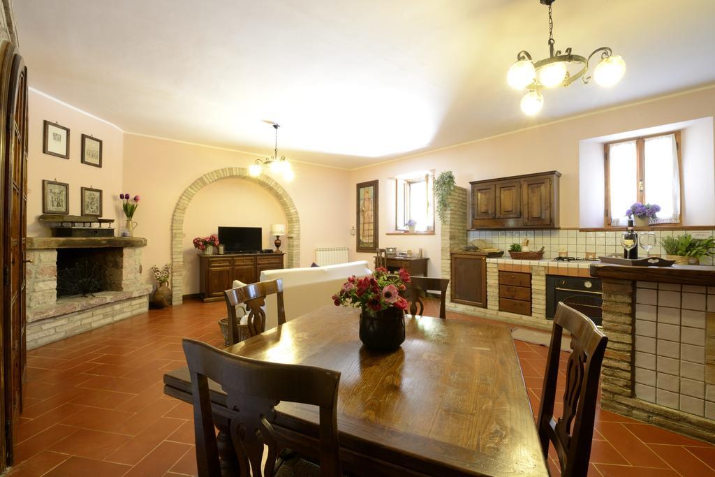 Gasthaus Le Querce Di Assisi Piano Delle Pieve Exterior foto